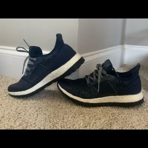 Navy blue adidas shoes